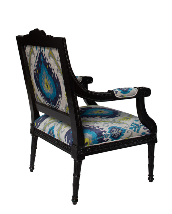 Intricate Patterned Armchair with Ornate Carved Black Frame
