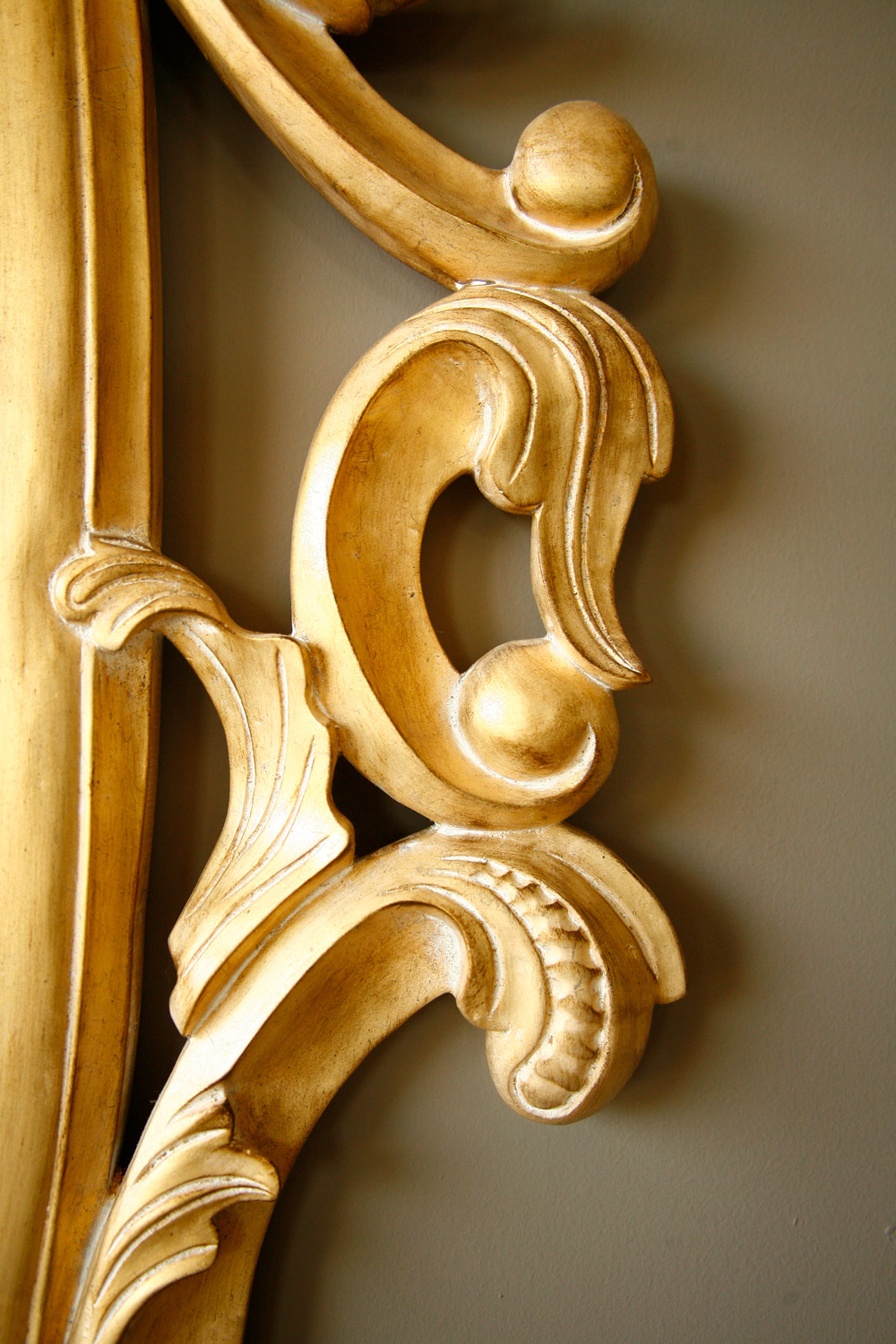 Hand carved frame in golden colour